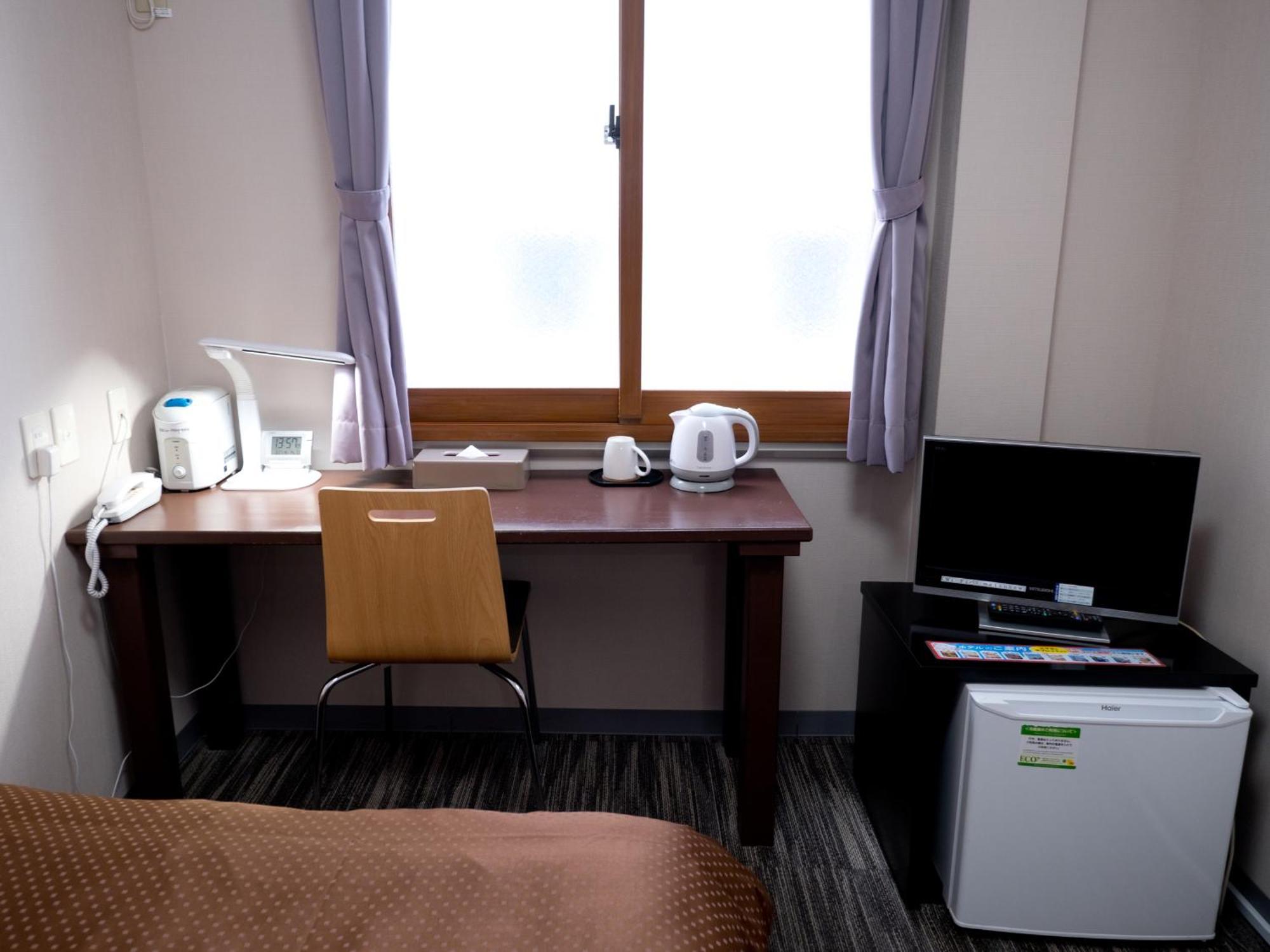 Matsuyama New Grand Hotel Pokoj fotografie
